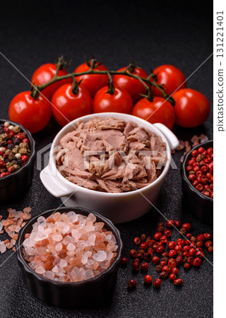 Tuna, canned fish in a can and on a plate for making sandwiches and other food. Canned tuna Tuna, canned fish in a can and on a plate for making sandwiches and other food. Canned tuna 131221401