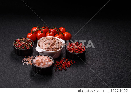 Tuna, canned fish in a can and on a plate for making sandwiches and other food. Canned tuna Tuna, canned fish in a can and on a plate for making sandwiches and other food. Canned tuna 131221402