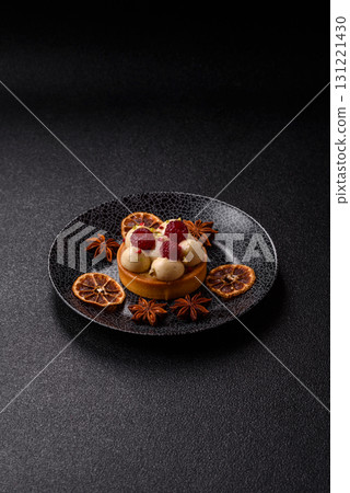 Sweet cake or tart round with cream and raspberries. Raspberry sweet tart Sweet cake or tart round with cream and raspberries. Raspberry sweet tart 131221430