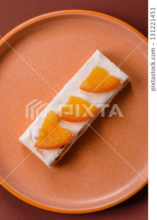 Nougat or white caramel with hazelnuts and pistachios and citrus pieces. White nougat with nuts Nougat or white caramel with hazelnuts and pistachios and citrus pieces. White nougat with nuts 131221451