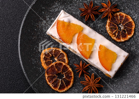 Nougat or white caramel with hazelnuts and pistachios and citrus pieces. White nougat with nuts Nougat or white caramel with hazelnuts and pistachios and citrus pieces. White nougat with nuts 131221466