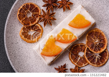 Nougat or white caramel with hazelnuts and pistachios and citrus pieces. White nougat with nuts Nougat or white caramel with hazelnuts and pistachios and citrus pieces. White nougat with nuts 131221482