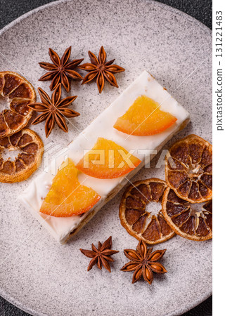 Nougat or white caramel with hazelnuts and pistachios and citrus pieces. White nougat with nuts Nougat or white caramel with hazelnuts and pistachios and citrus pieces. White nougat with nuts 131221483