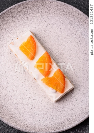 Nougat or white caramel with hazelnuts and pistachios and citrus pieces. White nougat with nuts Nougat or white caramel with hazelnuts and pistachios and citrus pieces. White nougat with nuts 131221487