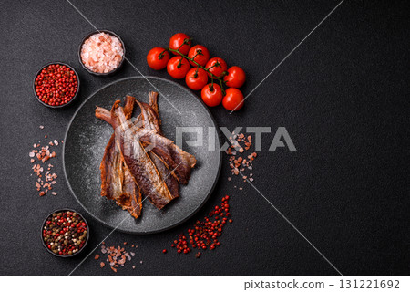 Dried salted fish as snacks or jerky, seafood as slices. Dried seafood snacks Dried salted fish as snacks or jerky, seafood as slices. Dried seafood snacks 131221692