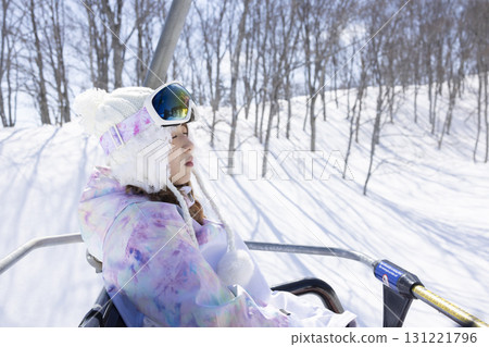 Cute woman enjoying skiing Cute woman enjoying skiing 131221796