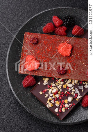 Bar sweet craft artisan chocolate with dried fruits made at home. Craft chocolate Bar sweet craft artisan chocolate with dried fruits made at home. Craft chocolate 131221977