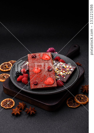 Bar sweet craft artisan chocolate with dried fruits made at home. Craft chocolate 131221986
