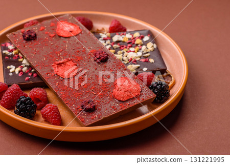Bar sweet craft artisan chocolate with dried fruits made at home. Craft chocolate 131221995