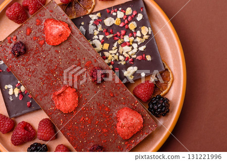 Bar sweet craft artisan chocolate with dried fruits made at home. Craft chocolate 131221996