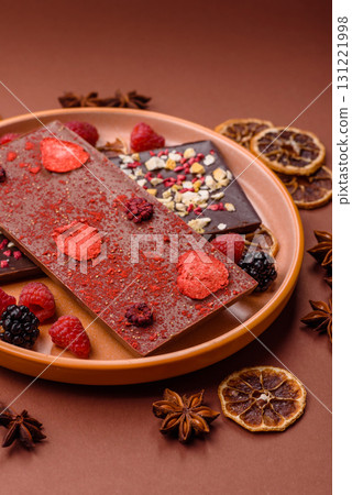 Bar sweet craft artisan chocolate with dried fruits made at home. Craft chocolate Bar sweet craft artisan chocolate with dried fruits made at home. Craft chocolate 131221998