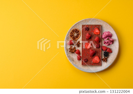 Bar sweet craft artisan chocolate with dried fruits made at home. Craft chocolate Bar sweet craft artisan chocolate with dried fruits made at home. Craft chocolate 131222004