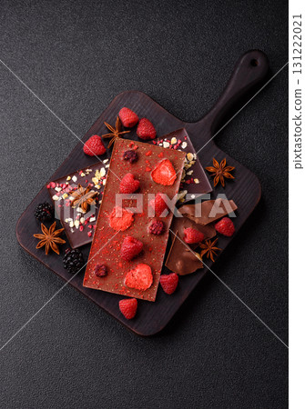 Bar sweet craft artisan chocolate with dried fruits made at home. Craft chocolate Bar sweet craft artisan chocolate with dried fruits made at home. Craft chocolate 131222021