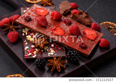 Bar sweet craft artisan chocolate with dried fruits made at home. Craft chocolate Bar sweet craft artisan chocolate with dried fruits made at home. Craft chocolate 131222027