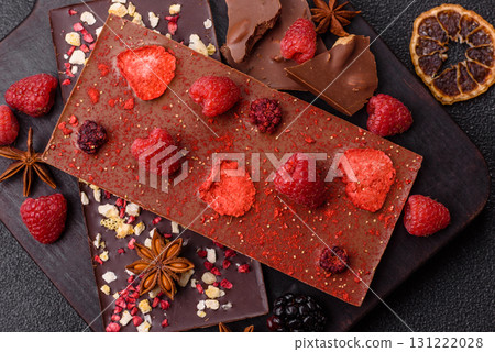 Bar sweet craft artisan chocolate with dried fruits made at home. Craft chocolate Bar sweet craft artisan chocolate with dried fruits made at home. Craft chocolate 131222028