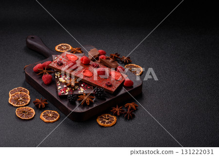 Bar sweet craft artisan chocolate with dried fruits made at home. Craft chocolate Bar sweet craft artisan chocolate with dried fruits made at home. Craft chocolate 131222031