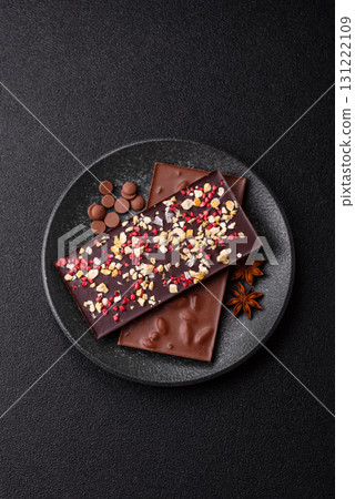 Bar sweet craft artisan chocolate with dried fruits made at home. Craft chocolate 131222109