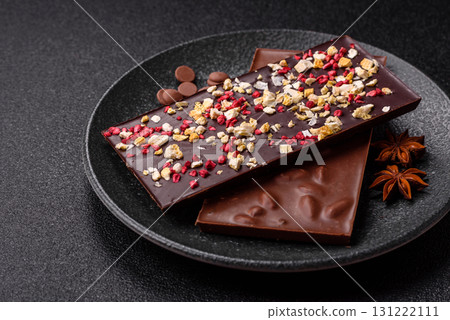 Bar sweet craft artisan chocolate with dried fruits made at home. Craft chocolate Bar sweet craft artisan chocolate with dried fruits made at home. Craft chocolate 131222111