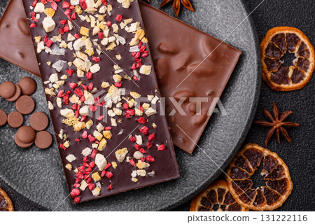 Bar sweet craft artisan chocolate with dried fruits made at home. Craft chocolate Bar sweet craft artisan chocolate with dried fruits made at home. Craft chocolate 131222116