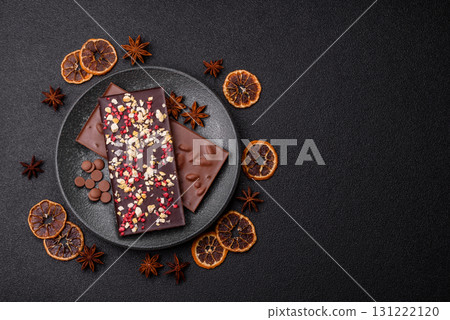 Bar sweet craft artisan chocolate with dried fruits made at home. Craft chocolate Bar sweet craft artisan chocolate with dried fruits made at home. Craft chocolate 131222120