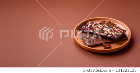 Bar sweet craft artisan chocolate with dried fruits made at home. Craft chocolate Bar sweet craft artisan chocolate with dried fruits made at home. Craft chocolate 131222123