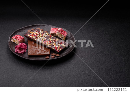 Bar sweet craft artisan chocolate with dried fruits made at home. Craft chocolate Bar sweet craft artisan chocolate with dried fruits made at home. Craft chocolate 131222151