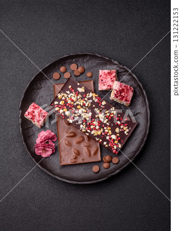 Bar sweet craft artisan chocolate with dried fruits made at home. Craft chocolate Bar sweet craft artisan chocolate with dried fruits made at home. Craft chocolate 131222153