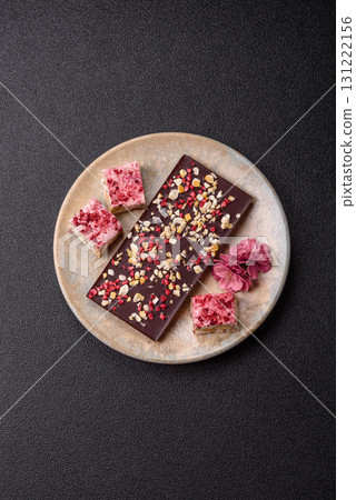 Bar sweet craft artisan chocolate with dried fruits made at home. Craft chocolate 131222156