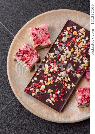 Bar sweet craft artisan chocolate with dried fruits made at home. Craft chocolate 131222160
