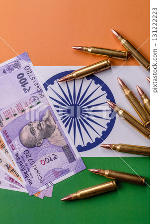 Money and flag of India with ammunition and tank as a concept of weapons for war. India and weapons Money and flag of India with ammunition and tank as a concept of weapons for war. India and weapons 131222223