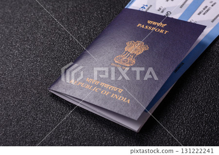Indian passport and tickets for travelling, flying and doing business. India document, id 131222241