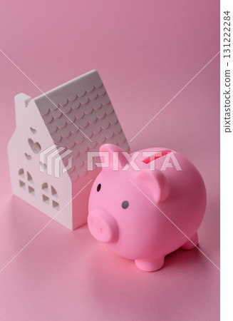 House, buying or selling real estate, concept background with money and piggy bank. Real estate 131222284