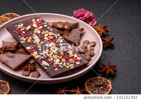 Bar sweet craft artisan chocolate with dried fruits made at home. Craft chocolate Bar sweet craft artisan chocolate with dried fruits made at home. Craft chocolate 131222302