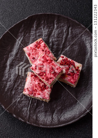 Nougat or white caramel with hazelnuts and strawberry pieces. White nougat 131222343