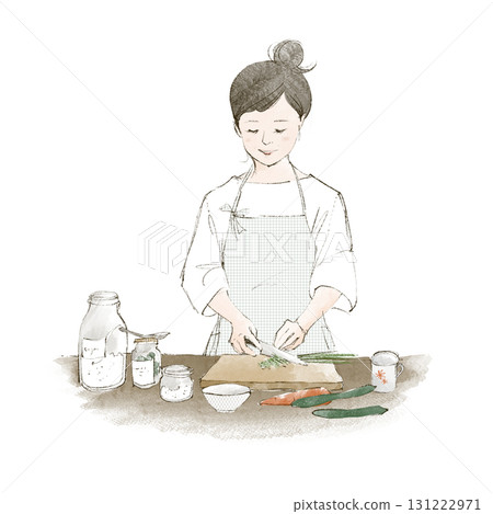 A woman standing in the kitchen A woman standing in the kitchen 131222971