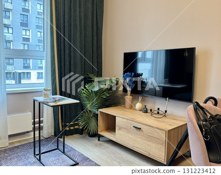 modern living room in a stylish interior of a new apartment with designer renovation 131223412