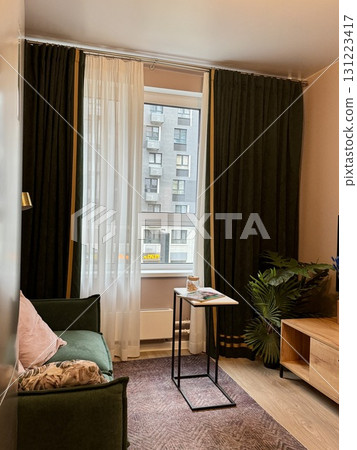 modern living room in a stylish interior of a new apartment with designer renovation 131223417