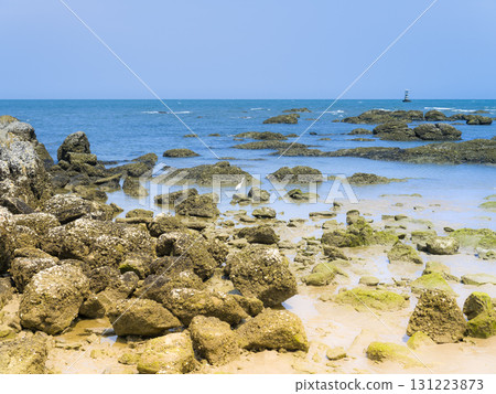 Hua Hin's coastline and blue sea, dotted with rocky beaches / Hat Hua Hin, Thailand 131223873
