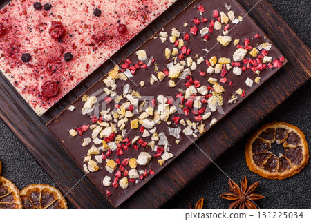 Bar sweet craft artisan chocolate with dried fruits made at home. Craft chocolate 131225034