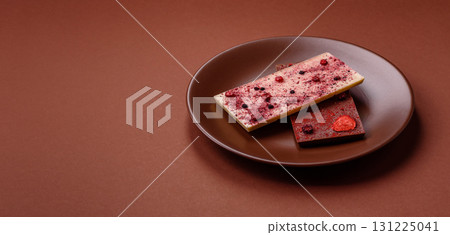 Bar sweet craft artisan chocolate with dried fruits made at home. Craft chocolate 131225041