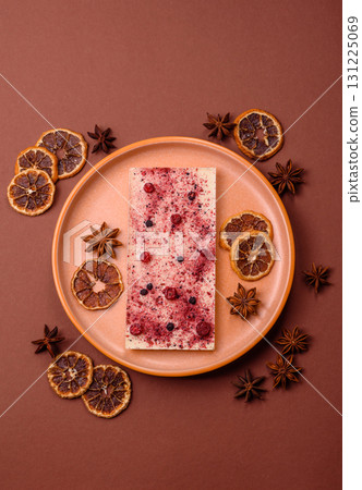 Bar sweet craft artisan chocolate with dried fruits made at home. Craft chocolate 131225069