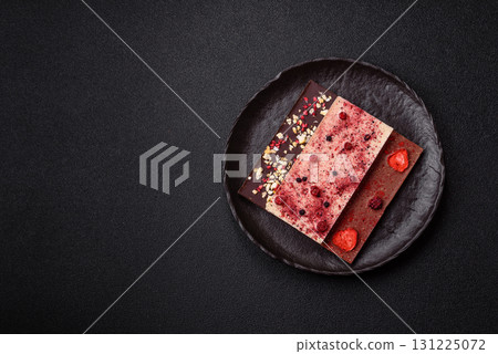 Bar sweet craft artisan chocolate with dried fruits made at home. Craft chocolate 131225072