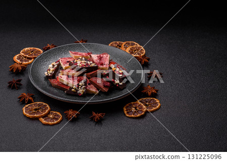 Bar sweet craft artisan chocolate with dried fruits made at home. Craft chocolate 131225096