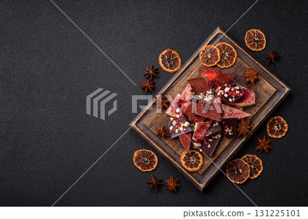 Bar sweet craft artisan chocolate with dried fruits made at home. Craft chocolate 131225101