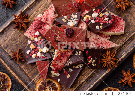 Bar sweet craft artisan chocolate with dried fruits made at home. Craft chocolate 131225105