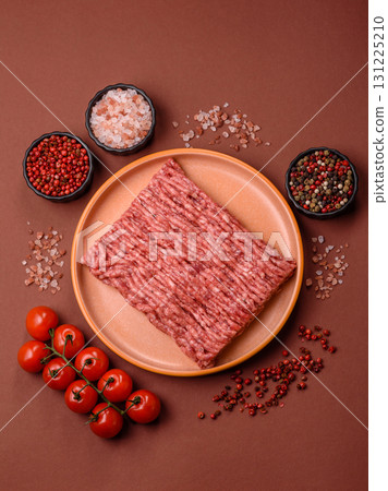 Raw ground beef meat food, ingredient for making cutlets or meatballs. Raw ground beef Raw ground beef meat food, ingredient for making cutlets or meatballs. Raw ground beef 131225210