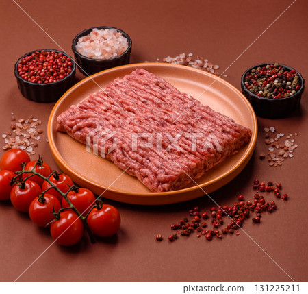 Raw ground beef meat food, ingredient for making cutlets or meatballs. Raw ground beef Raw ground beef meat food, ingredient for making cutlets or meatballs. Raw ground beef 131225211