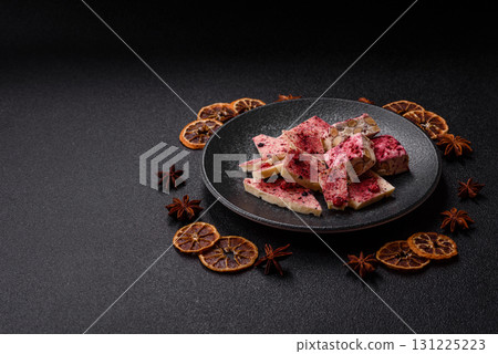 Bar sweet craft artisan chocolate with dried fruits made at home. Craft chocolate Bar sweet craft artisan chocolate with dried fruits made at home. Craft chocolate 131225223