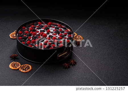 Pie, cheesecake with raspberries and blackberries, mascarpone cheese. Piece of cheesecake 131225257