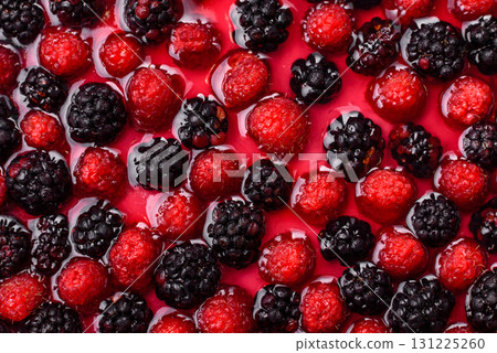 Pie, cheesecake with raspberries and blackberries, mascarpone cheese. Piece of cheesecake 131225260